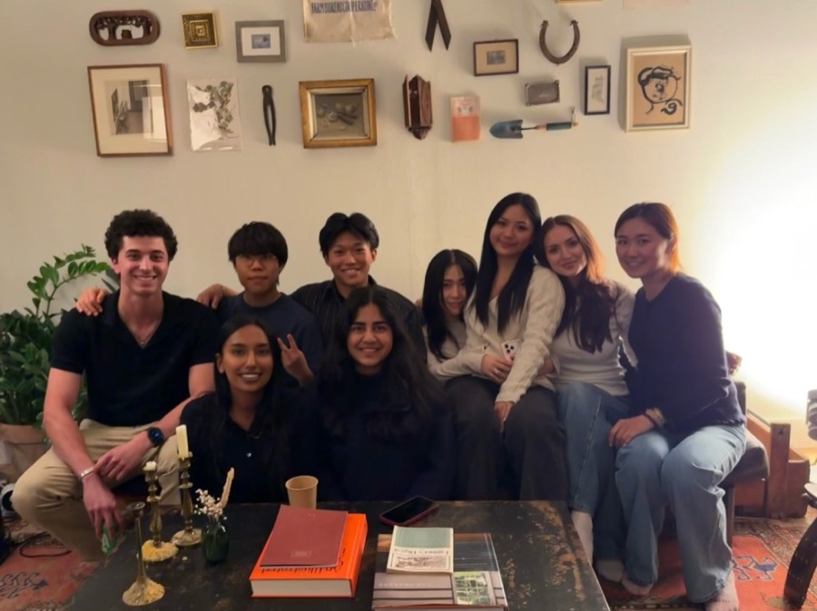 group photo with friends in a living room